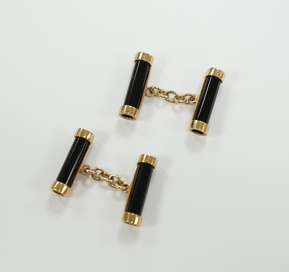 A pair of 9ct gold and black onyx baton shaped cufflinks, 22mm, gross weight 9.5 grams.